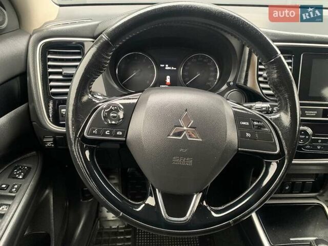 Коричневий Міцубісі Аутлендер, об'ємом двигуна 2 л та пробігом 125 тис. км за 18700 $, фото 92 на Automoto.ua