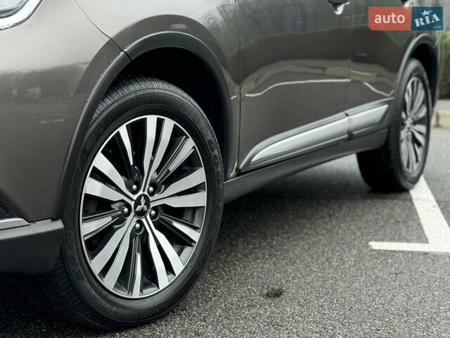 Коричневый Мицубиси Аутлендер, объемом двигателя 2 л и пробегом 154 тыс. км за 14999 $, фото 37 на Automoto.ua