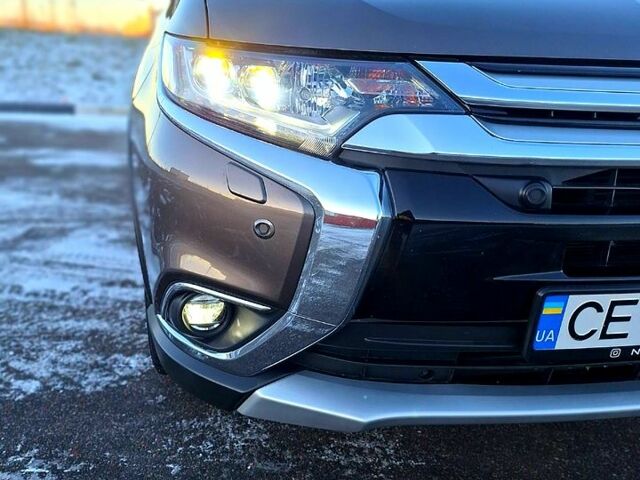 Коричневий Міцубісі Аутлендер, об'ємом двигуна 2.4 л та пробігом 129 тис. км за 20499 $, фото 9 на Automoto.ua