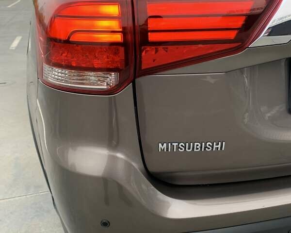 Коричневий Міцубісі Аутлендер, об'ємом двигуна 2 л та пробігом 125 тис. км за 18700 $, фото 54 на Automoto.ua