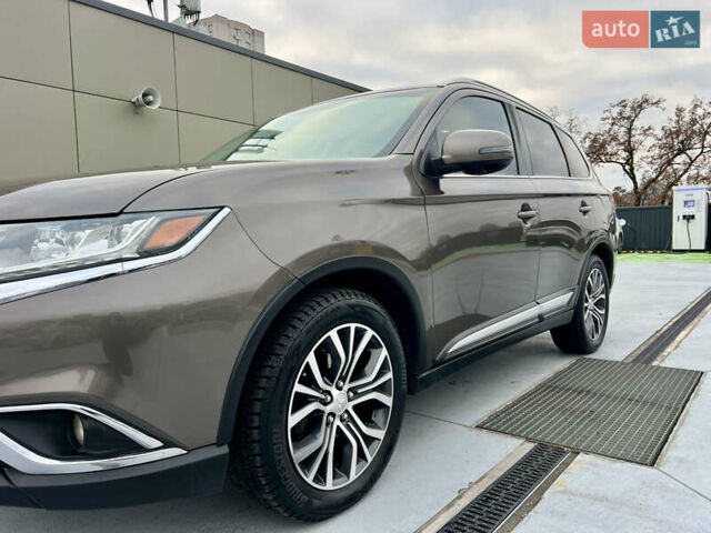 Коричневый Мицубиси Аутлендер, объемом двигателя 2.4 л и пробегом 192 тыс. км за 19500 $, фото 34 на Automoto.ua