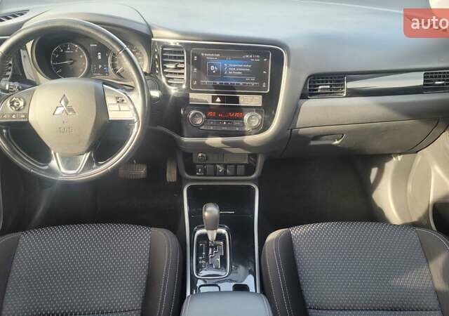 Коричневый Мицубиси Аутлендер, объемом двигателя 2 л и пробегом 125 тыс. км за 15500 $, фото 2 на Automoto.ua