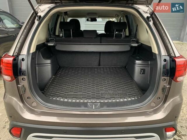 Коричневий Міцубісі Аутлендер, об'ємом двигуна 2 л та пробігом 125 тис. км за 18700 $, фото 63 на Automoto.ua