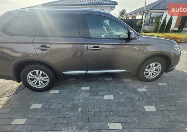 Коричневый Мицубиси Аутлендер, объемом двигателя 2 л и пробегом 125 тыс. км за 15500 $, фото 3 на Automoto.ua