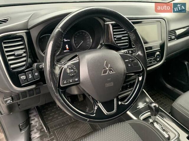 Коричневий Міцубісі Аутлендер, об'ємом двигуна 2 л та пробігом 125 тис. км за 18700 $, фото 75 на Automoto.ua