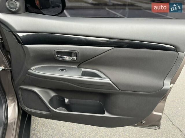 Коричневый Мицубиси Аутлендер, объемом двигателя 2 л и пробегом 154 тыс. км за 14999 $, фото 51 на Automoto.ua