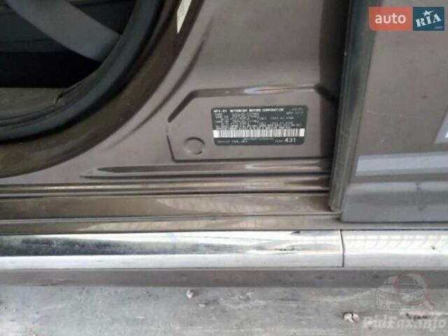 Коричневий Міцубісі Аутлендер, об'ємом двигуна 2 л та пробігом 128 тис. км за 6500 $, фото 2 на Automoto.ua