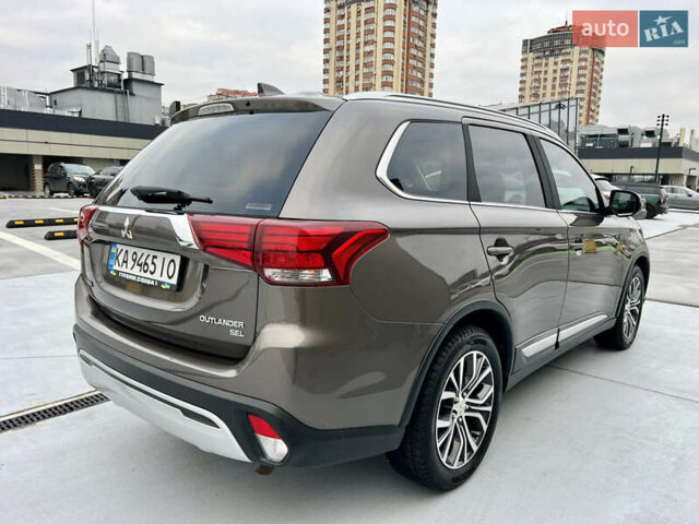 Коричневый Мицубиси Аутлендер, объемом двигателя 2.4 л и пробегом 192 тыс. км за 19500 $, фото 23 на Automoto.ua
