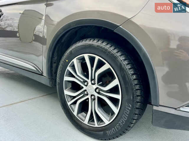 Коричневый Мицубиси Аутлендер, объемом двигателя 2.4 л и пробегом 192 тыс. км за 19500 $, фото 18 на Automoto.ua