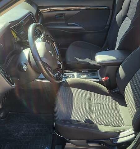 Коричневый Мицубиси Аутлендер, объемом двигателя 2 л и пробегом 175 тыс. км за 18900 $, фото 13 на Automoto.ua