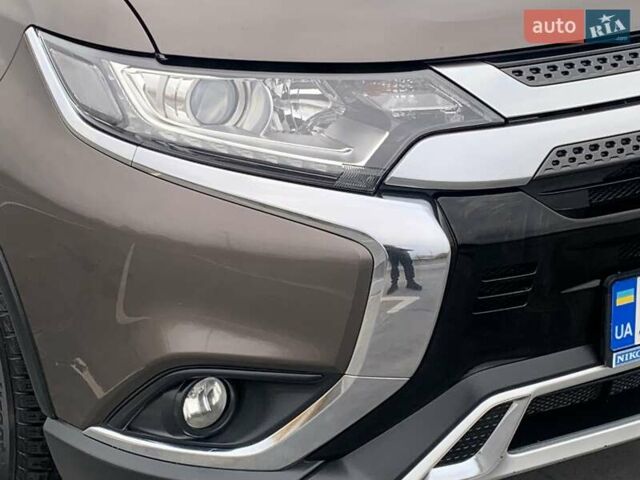 Коричневий Міцубісі Аутлендер, об'ємом двигуна 2 л та пробігом 125 тис. км за 18700 $, фото 48 на Automoto.ua