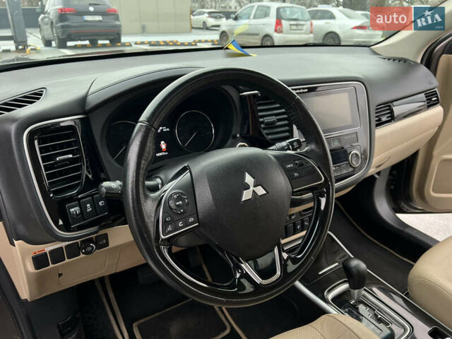 Коричневый Мицубиси Аутлендер, объемом двигателя 2.4 л и пробегом 192 тыс. км за 19500 $, фото 14 на Automoto.ua