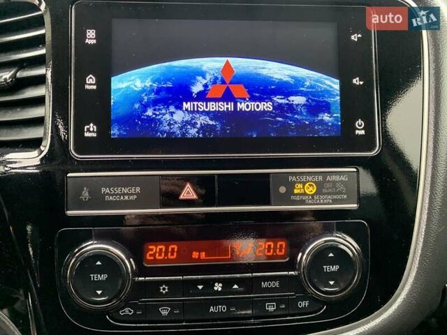 Коричневий Міцубісі Аутлендер, об'ємом двигуна 2 л та пробігом 125 тис. км за 18700 $, фото 98 на Automoto.ua