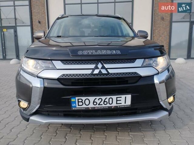 Коричневий Міцубісі Аутлендер, об'ємом двигуна 2.4 л та пробігом 198 тис. км за 18700 $, фото 1 на Automoto.ua