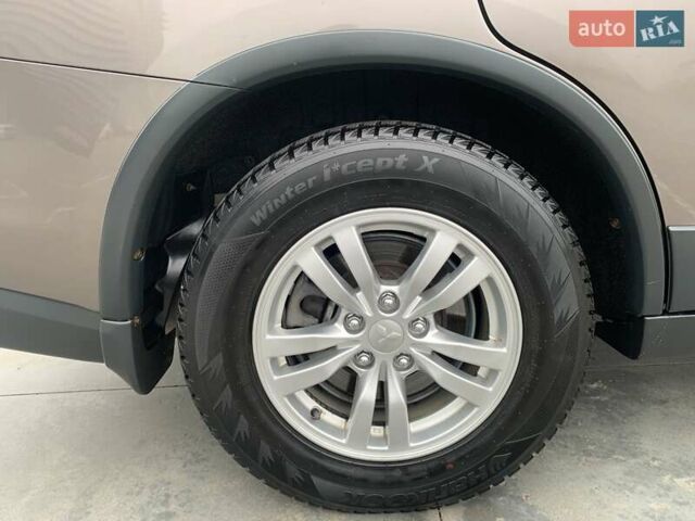 Коричневий Міцубісі Аутлендер, об'ємом двигуна 2 л та пробігом 125 тис. км за 18700 $, фото 59 на Automoto.ua