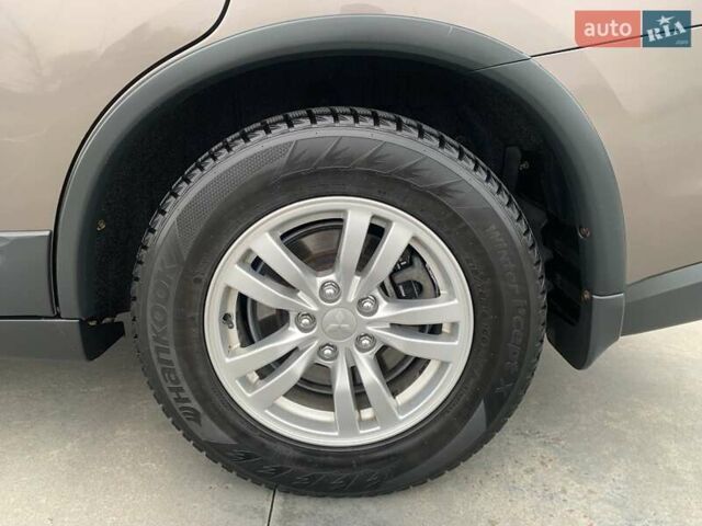 Коричневий Міцубісі Аутлендер, об'ємом двигуна 2 л та пробігом 125 тис. км за 18700 $, фото 58 на Automoto.ua