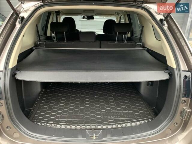 Коричневий Міцубісі Аутлендер, об'ємом двигуна 2 л та пробігом 125 тис. км за 18700 $, фото 64 на Automoto.ua