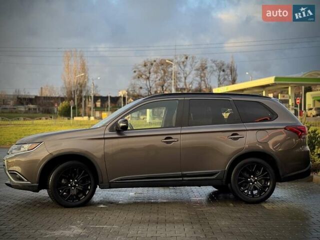 Коричневый Мицубиси Аутлендер, объемом двигателя 2.36 л и пробегом 58 тыс. км за 19500 $, фото 7 на Automoto.ua