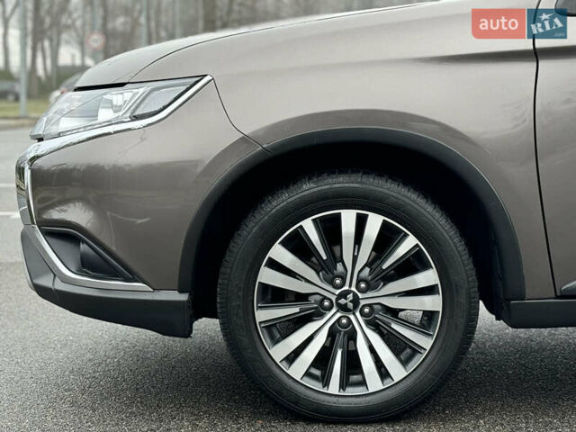 Коричневый Мицубиси Аутлендер, объемом двигателя 2 л и пробегом 154 тыс. км за 14999 $, фото 36 на Automoto.ua