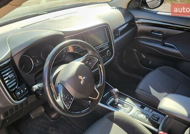 Коричневый Мицубиси Аутлендер, объемом двигателя 2 л и пробегом 175 тыс. км за 18900 $, фото 12 на Automoto.ua