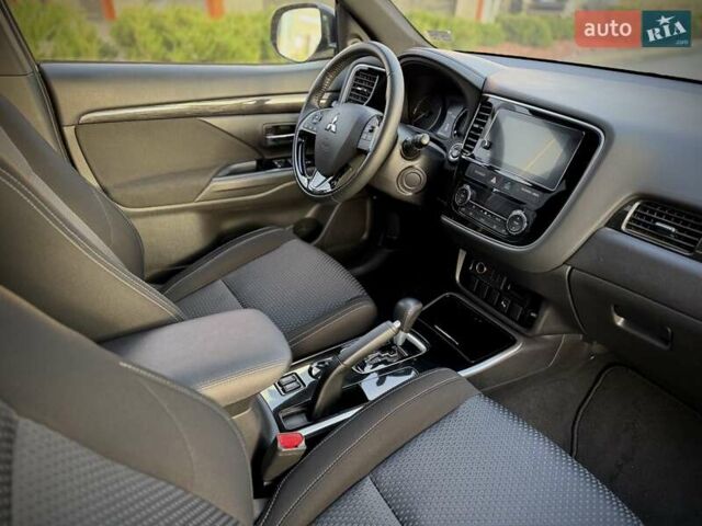 Коричневый Мицубиси Аутлендер, объемом двигателя 2.36 л и пробегом 58 тыс. км за 19500 $, фото 17 на Automoto.ua