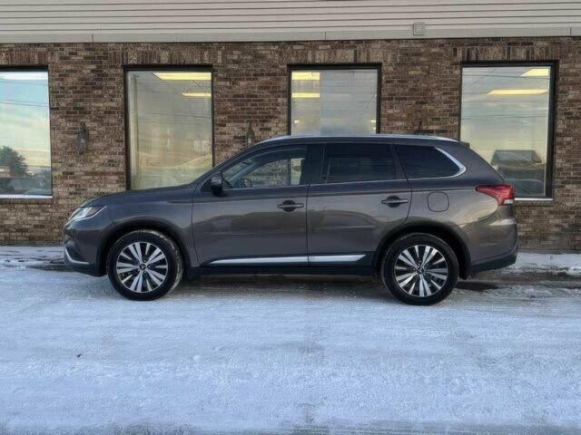 Коричневый Мицубиси Аутлендер, объемом двигателя 2.4 л и пробегом 36 тыс. км за 14000 $, фото 5 на Automoto.ua