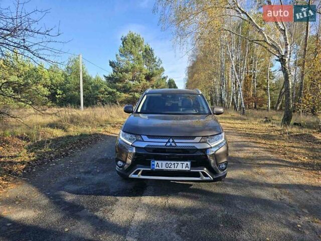 Коричневый Мицубиси Аутлендер, объемом двигателя 2.36 л и пробегом 69 тыс. км за 19700 $, фото 5 на Automoto.ua