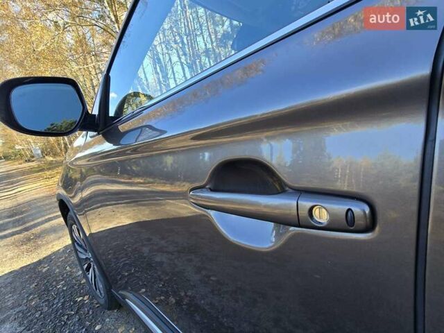 Коричневый Мицубиси Аутлендер, объемом двигателя 2.36 л и пробегом 69 тыс. км за 19700 $, фото 6 на Automoto.ua