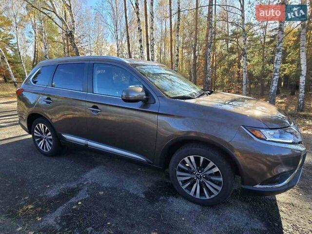 Коричневый Мицубиси Аутлендер, объемом двигателя 2.36 л и пробегом 69 тыс. км за 19700 $, фото 3 на Automoto.ua