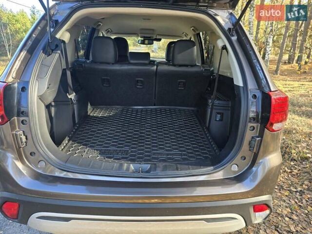 Коричневый Мицубиси Аутлендер, объемом двигателя 2.36 л и пробегом 69 тыс. км за 19700 $, фото 15 на Automoto.ua