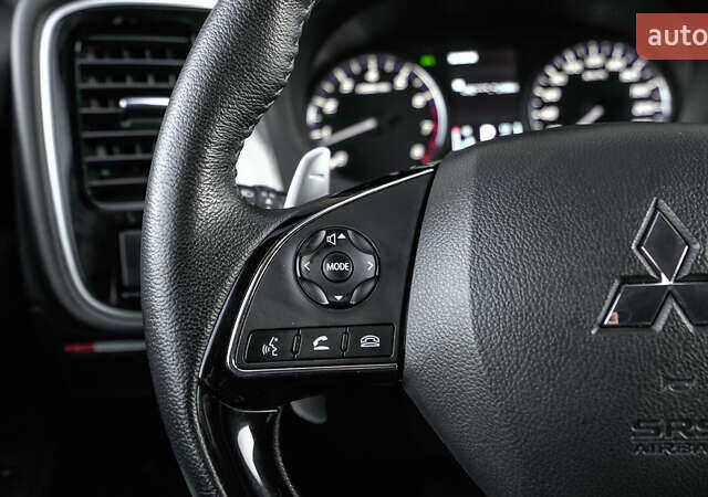 Коричневий Міцубісі Аутлендер, об'ємом двигуна 2.36 л та пробігом 80 тис. км за 24320 $, фото 18 на Automoto.ua