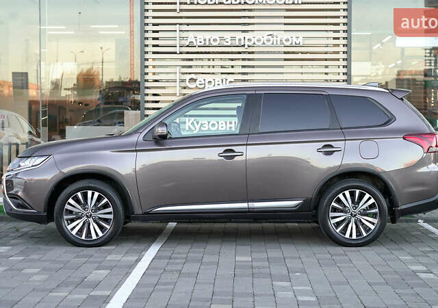 Коричневий Міцубісі Аутлендер, об'ємом двигуна 2.36 л та пробігом 80 тис. км за 24320 $, фото 2 на Automoto.ua