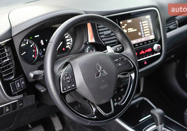 Коричневий Міцубісі Аутлендер, об'ємом двигуна 2.36 л та пробігом 80 тис. км за 24320 $, фото 15 на Automoto.ua