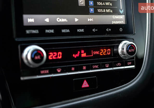 Коричневий Міцубісі Аутлендер, об'ємом двигуна 2.36 л та пробігом 80 тис. км за 24320 $, фото 28 на Automoto.ua