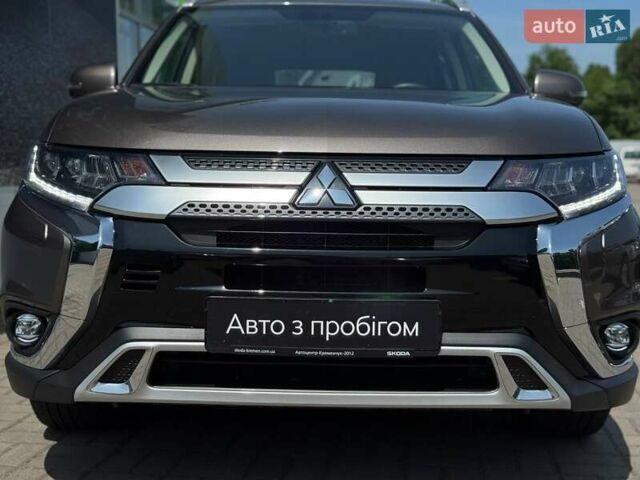 Коричневый Мицубиси Аутлендер, объемом двигателя 2.36 л и пробегом 52 тыс. км за 23900 $, фото 4 на Automoto.ua