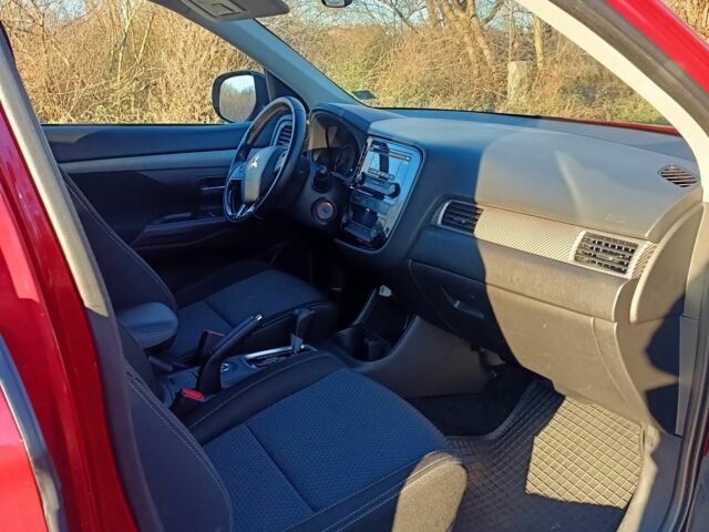 Червоний Міцубісі Аутлендер, об'ємом двигуна 2.4 л та пробігом 118 тис. км за 13000 $, фото 4 на Automoto.ua