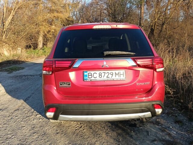 Червоний Міцубісі Аутлендер, об'ємом двигуна 2.4 л та пробігом 118 тис. км за 13000 $, фото 12 на Automoto.ua