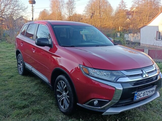 Червоний Міцубісі Аутлендер, об'ємом двигуна 2.4 л та пробігом 118 тис. км за 13000 $, фото 6 на Automoto.ua
