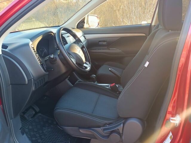 Червоний Міцубісі Аутлендер, об'ємом двигуна 2.4 л та пробігом 118 тис. км за 13000 $, фото 8 на Automoto.ua