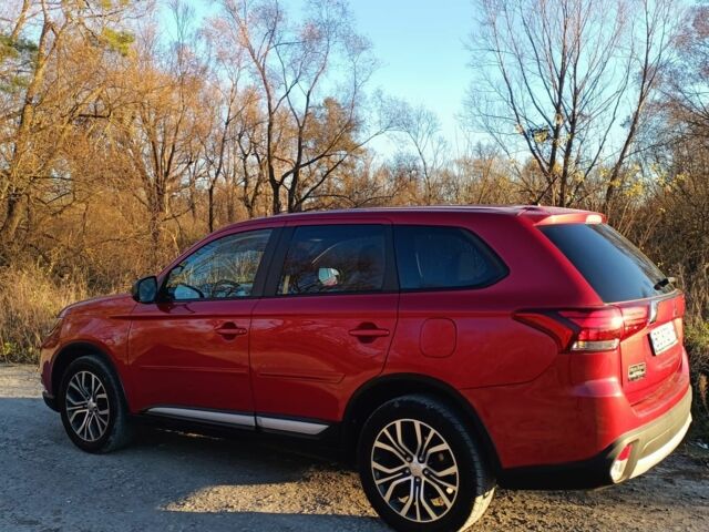 Червоний Міцубісі Аутлендер, об'ємом двигуна 2.4 л та пробігом 118 тис. км за 13000 $, фото 2 на Automoto.ua