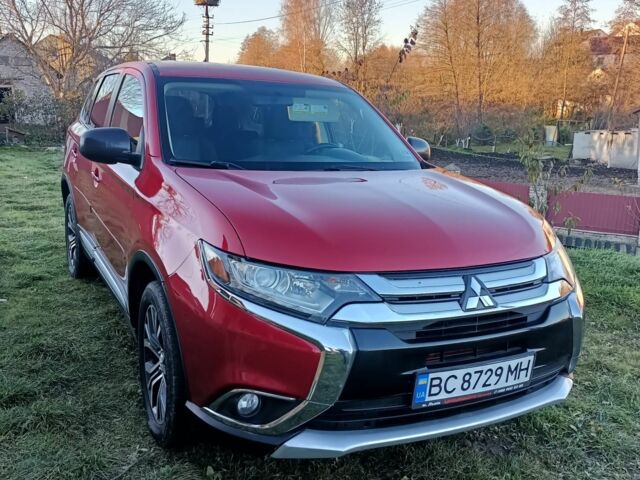 Червоний Міцубісі Аутлендер, об'ємом двигуна 2.4 л та пробігом 118 тис. км за 13000 $, фото 1 на Automoto.ua