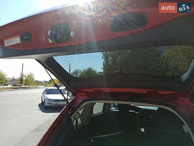 Червоний Міцубісі Аутлендер, об'ємом двигуна 2.4 л та пробігом 70 тис. км за 18500 $, фото 3 на Automoto.ua