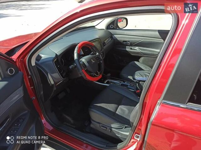 Червоний Міцубісі Аутлендер, об'ємом двигуна 2.4 л та пробігом 70 тис. км за 18500 $, фото 9 на Automoto.ua