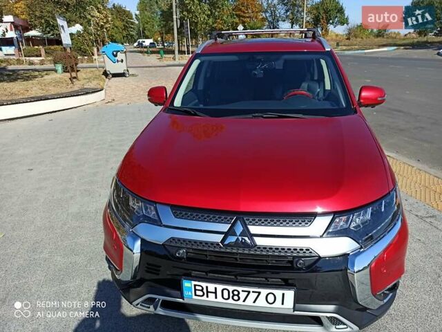 Червоний Міцубісі Аутлендер, об'ємом двигуна 2.4 л та пробігом 70 тис. км за 18500 $, фото 4 на Automoto.ua