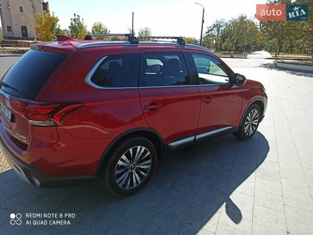 Червоний Міцубісі Аутлендер, об'ємом двигуна 2.4 л та пробігом 70 тис. км за 18500 $, фото 15 на Automoto.ua