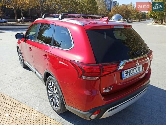 Червоний Міцубісі Аутлендер, об'ємом двигуна 2.4 л та пробігом 70 тис. км за 18500 $, фото 14 на Automoto.ua