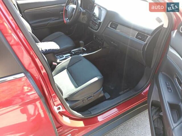 Червоний Міцубісі Аутлендер, об'ємом двигуна 2.4 л та пробігом 70 тис. км за 18500 $, фото 2 на Automoto.ua