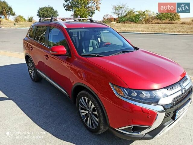 Червоний Міцубісі Аутлендер, об'ємом двигуна 2.4 л та пробігом 70 тис. км за 18500 $, фото 16 на Automoto.ua