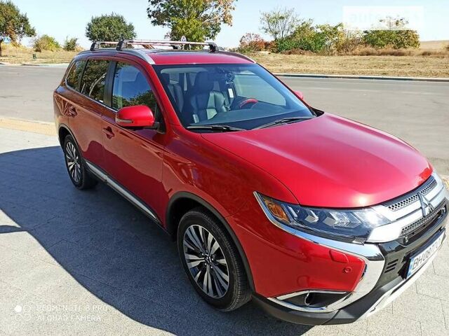 Красный Мицубиси Аутлендер, объемом двигателя 2.4 л и пробегом 45 тыс. км за 18500 $, фото 16 на Automoto.ua