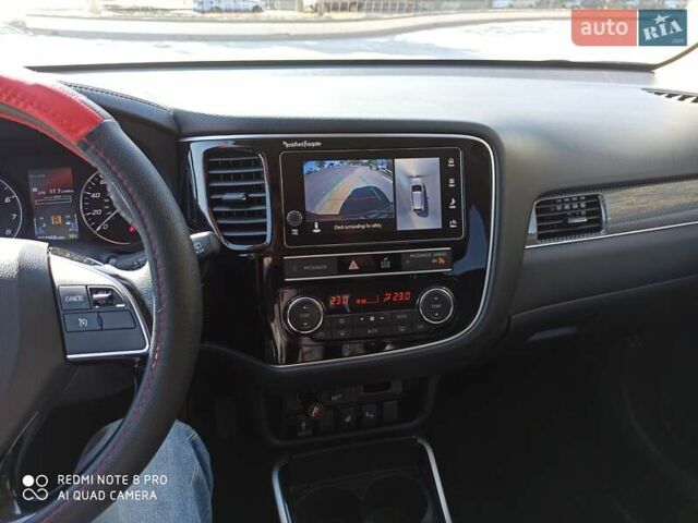 Червоний Міцубісі Аутлендер, об'ємом двигуна 2.4 л та пробігом 70 тис. км за 18500 $, фото 11 на Automoto.ua